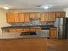 3 Bedroom kitchen with backsplash 3 Bedroom kitchen with backsplash at Stone Farm Apartments in Lebanon
